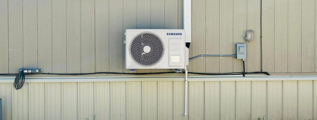 A heat pump is installed on a mobile home. 